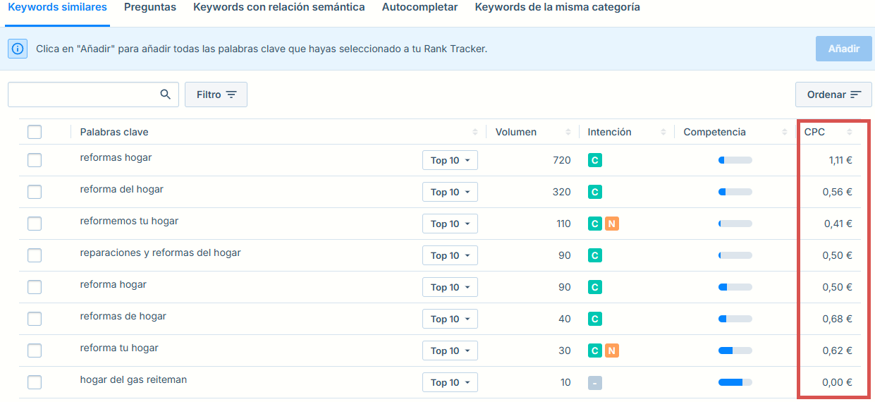 Interfaz del Buscador de Palabras Clave que muestra una tabla con palabras clave relacionadas con reformas del hogar, incluyendo columnas de volumen de búsqueda, intención, competencia y CPC.