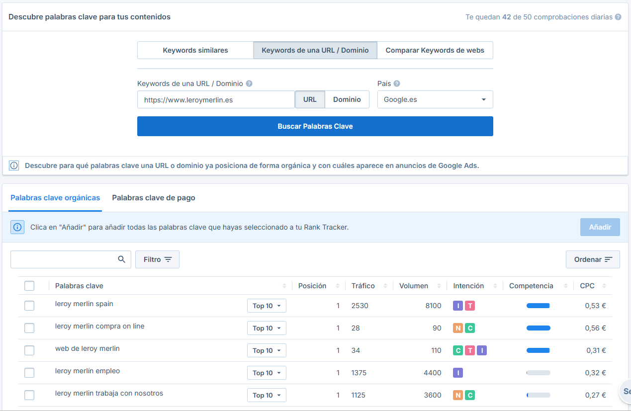 Interfaz del Buscador de Palabras Clave mostrando análisis de palabras clave orgánicas para el dominio leroymerlin.es con métricas de posición, tráfico, volumen e intención de búsqueda.